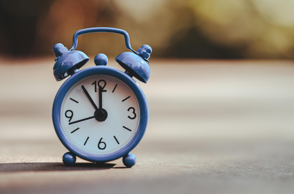 classic alarm clock on table